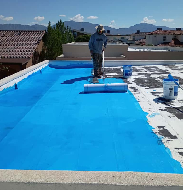 TPO Membrane Application: Professional installation of a durable commercial Flat Roof Replacement using a certified TPO membrane system in El Paso, TX.