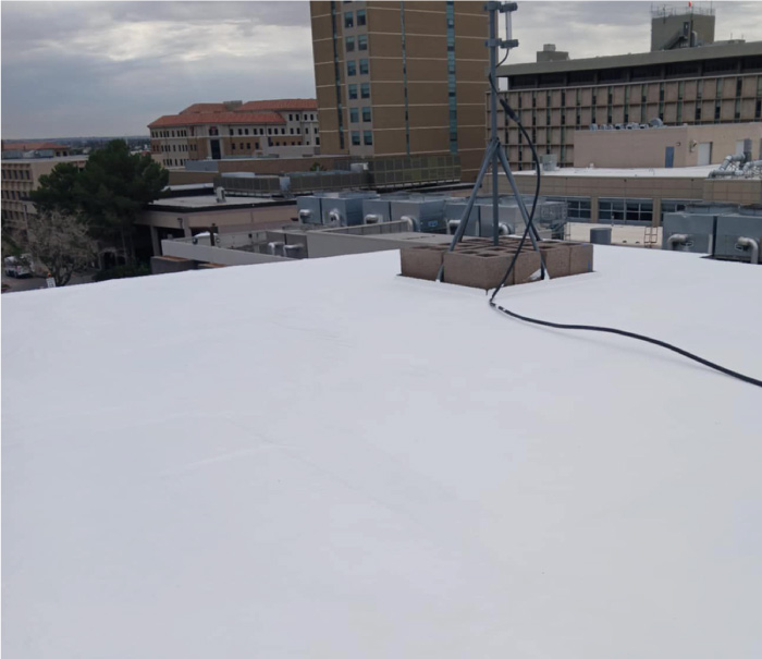 Completed, leak-free commercial Flat Roof Repair protecting a business near Fort Bliss, El Paso.